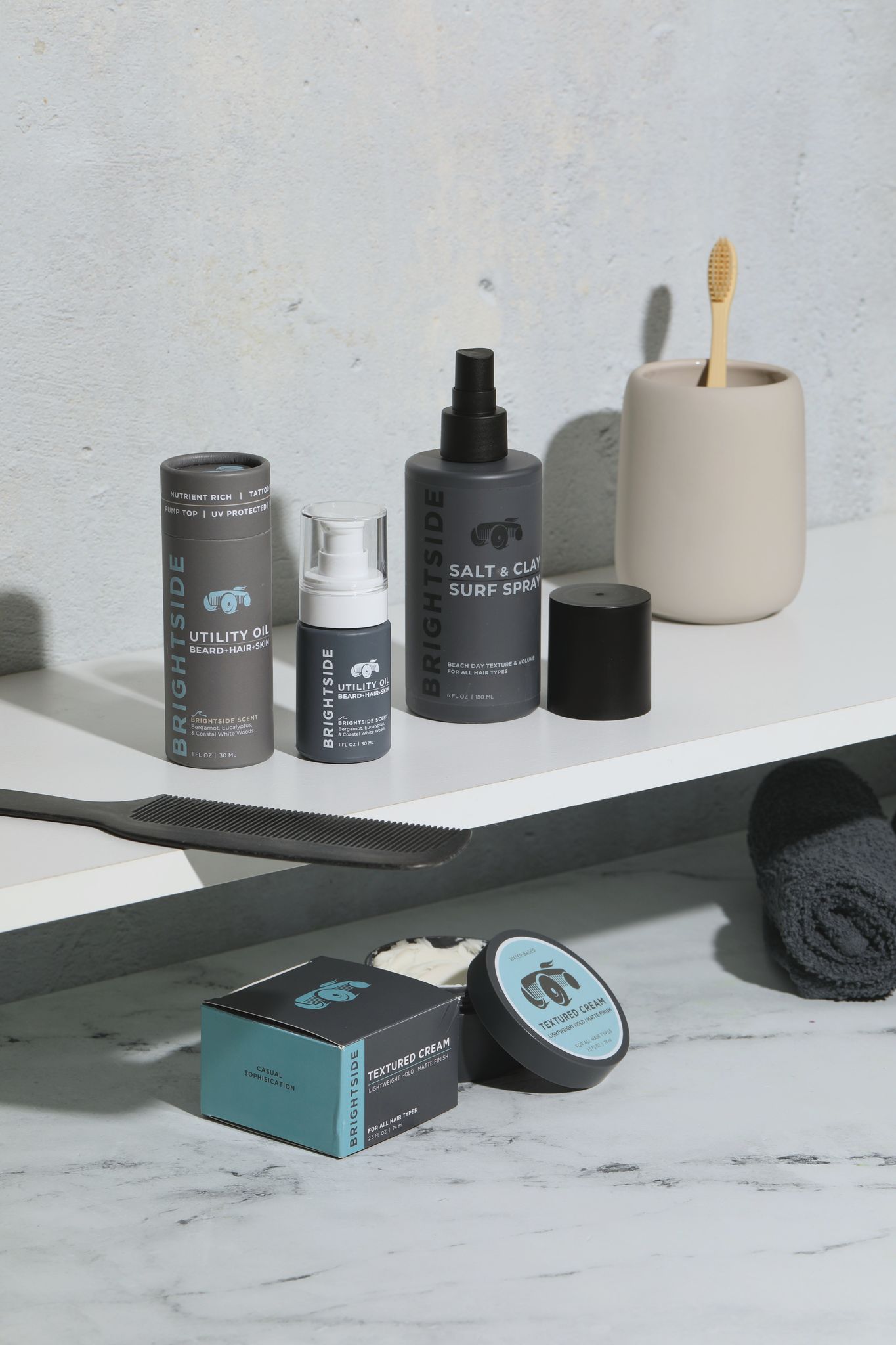 Brightside Barber styling and grooming products on bathroom shelf